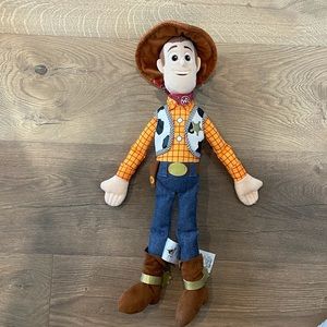 Brand New Woody doll from the Disney store.